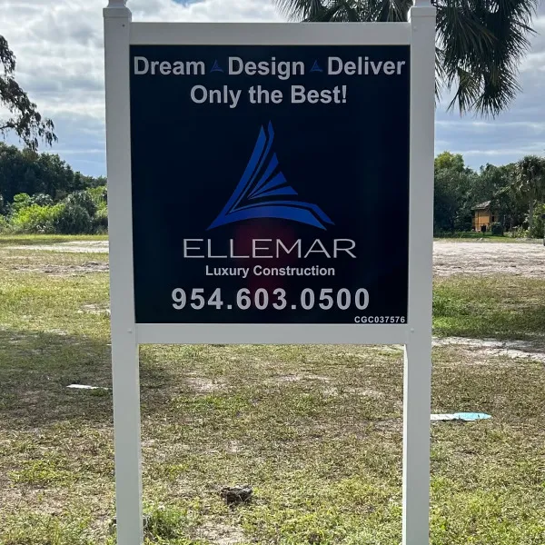 Post N Panel Sign announcing Luxury Construction Company doing work in community.