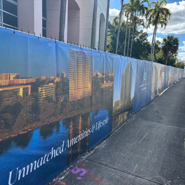 Fence Banners for Construction Site Announcing What is Coming in West Palm Beach, FL.