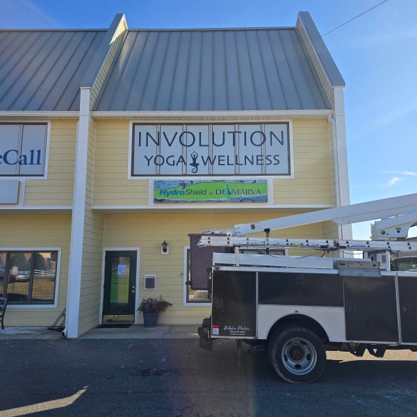 Involution Yoga and Wellness Window Graphics and Updated Pylon