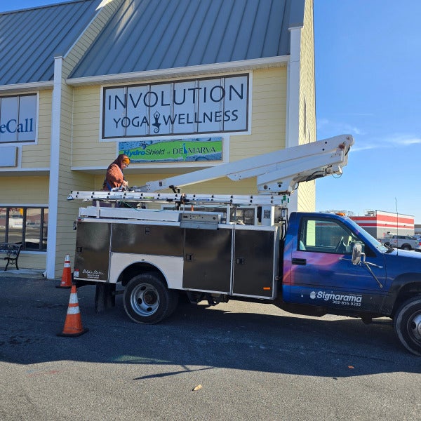 Involution Yoga and Wellness Window Graphics and Updated Pylon