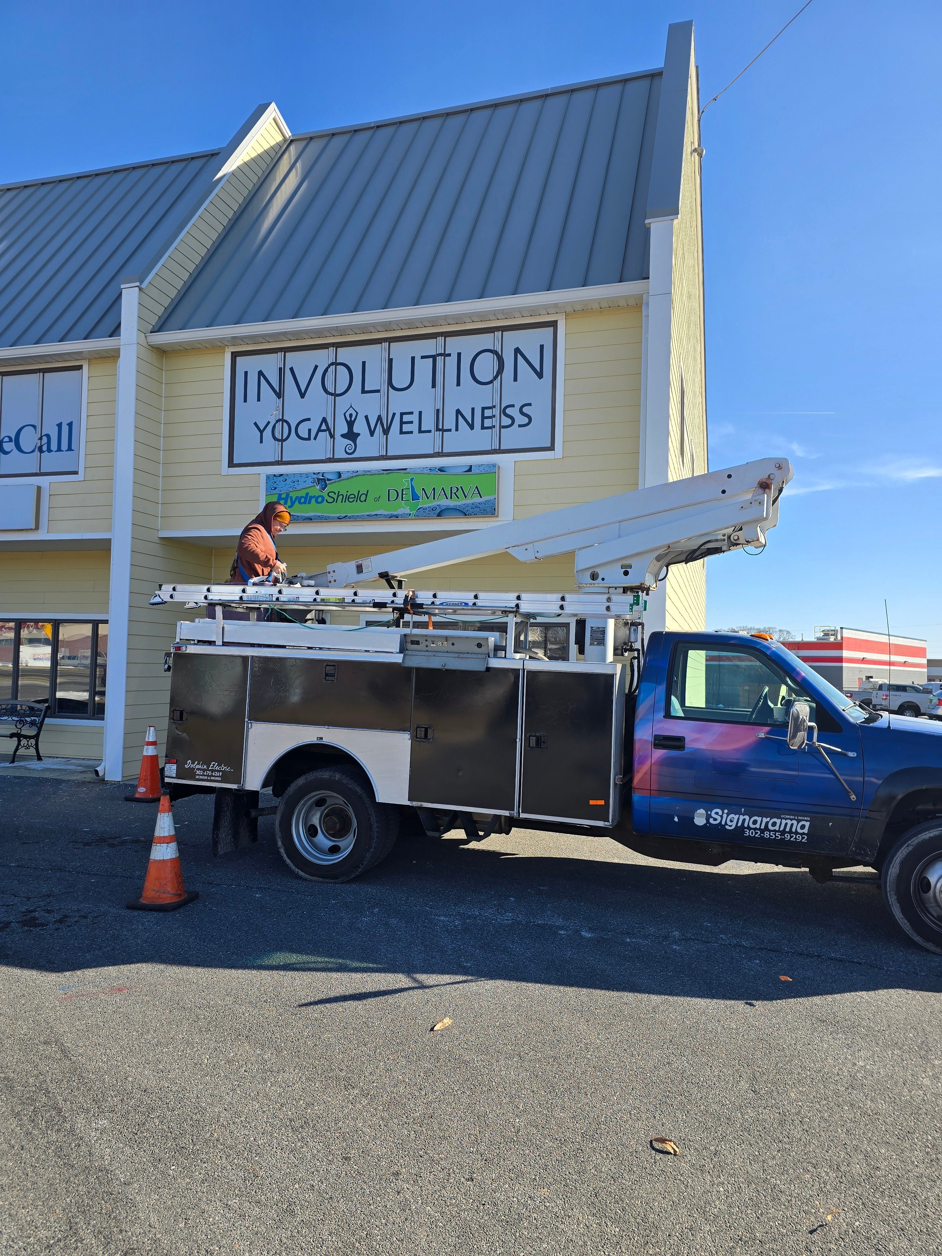Involution Yoga and Wellness Window Graphics and Updated Pylon
