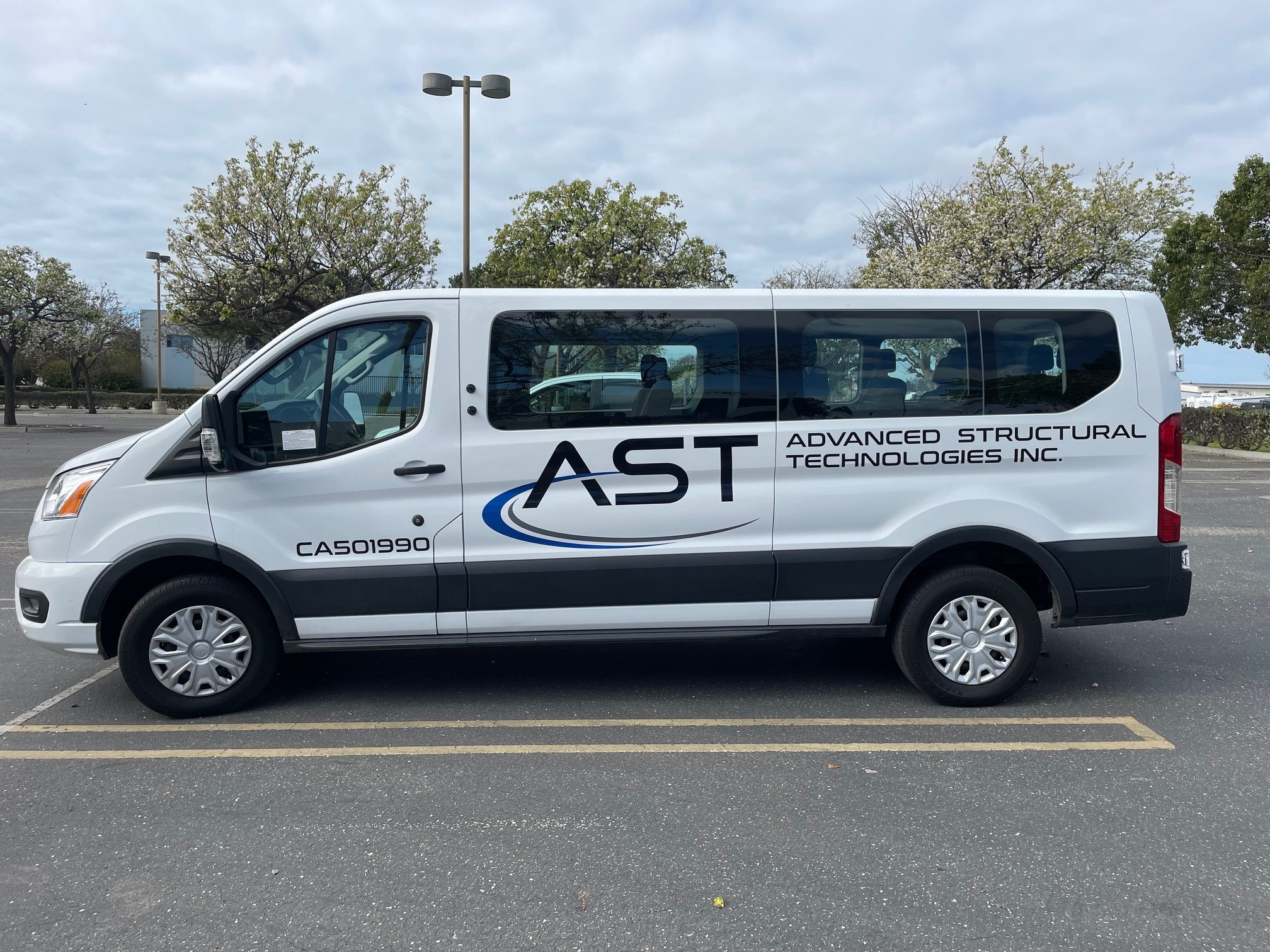 Custom Van Wrap for Advanced Structural Technologies Inc.: Branding on the Move