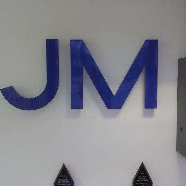 Backlit lobby sign for Johnson Matthey in West Deptford