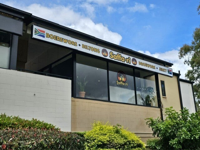 Vibrant lightbox faces and eye-catching window graphics for this new family business.
