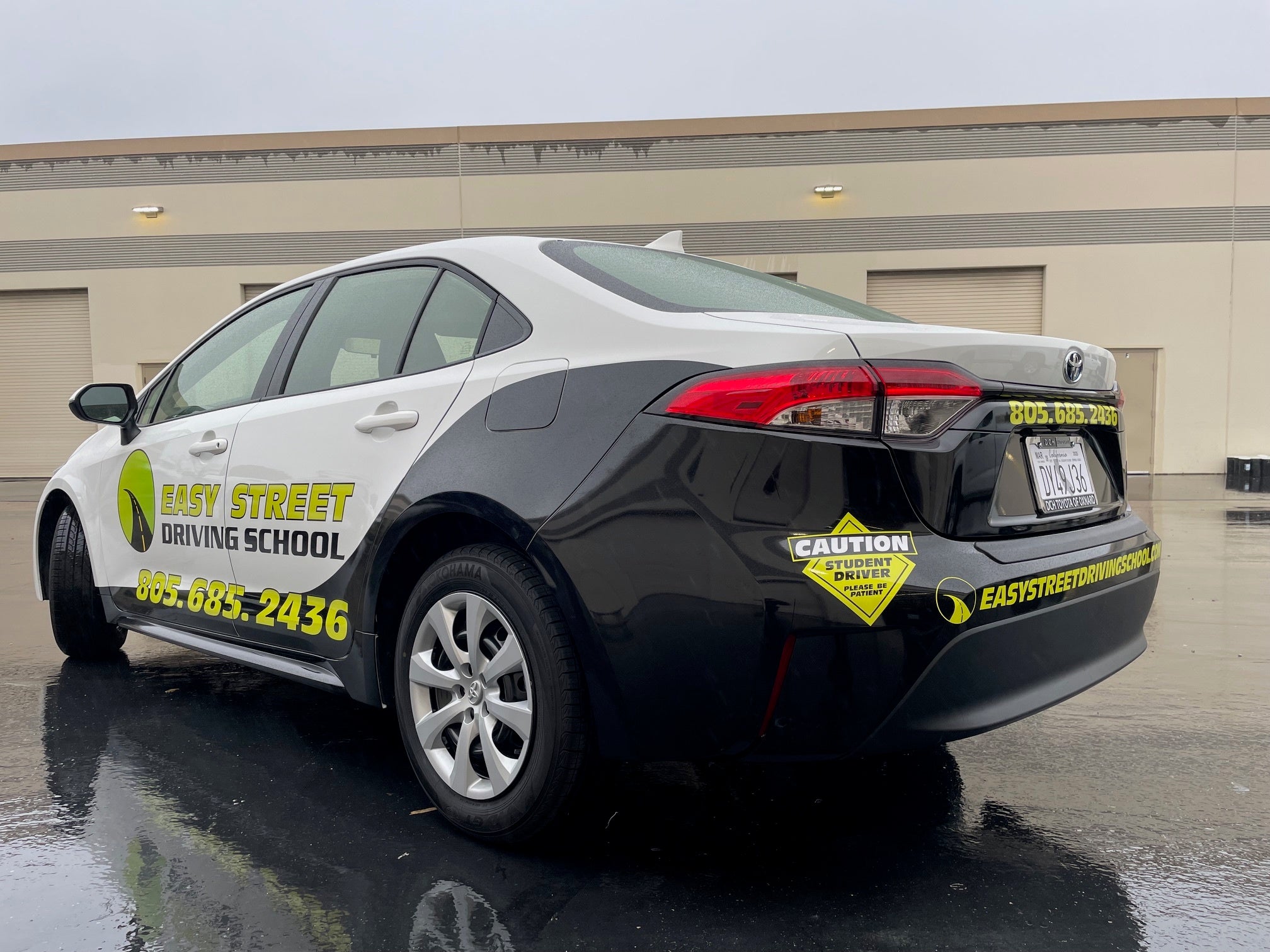Easy Street Driving School vehicle wrap designed by Signarama showcasing branding and safety features