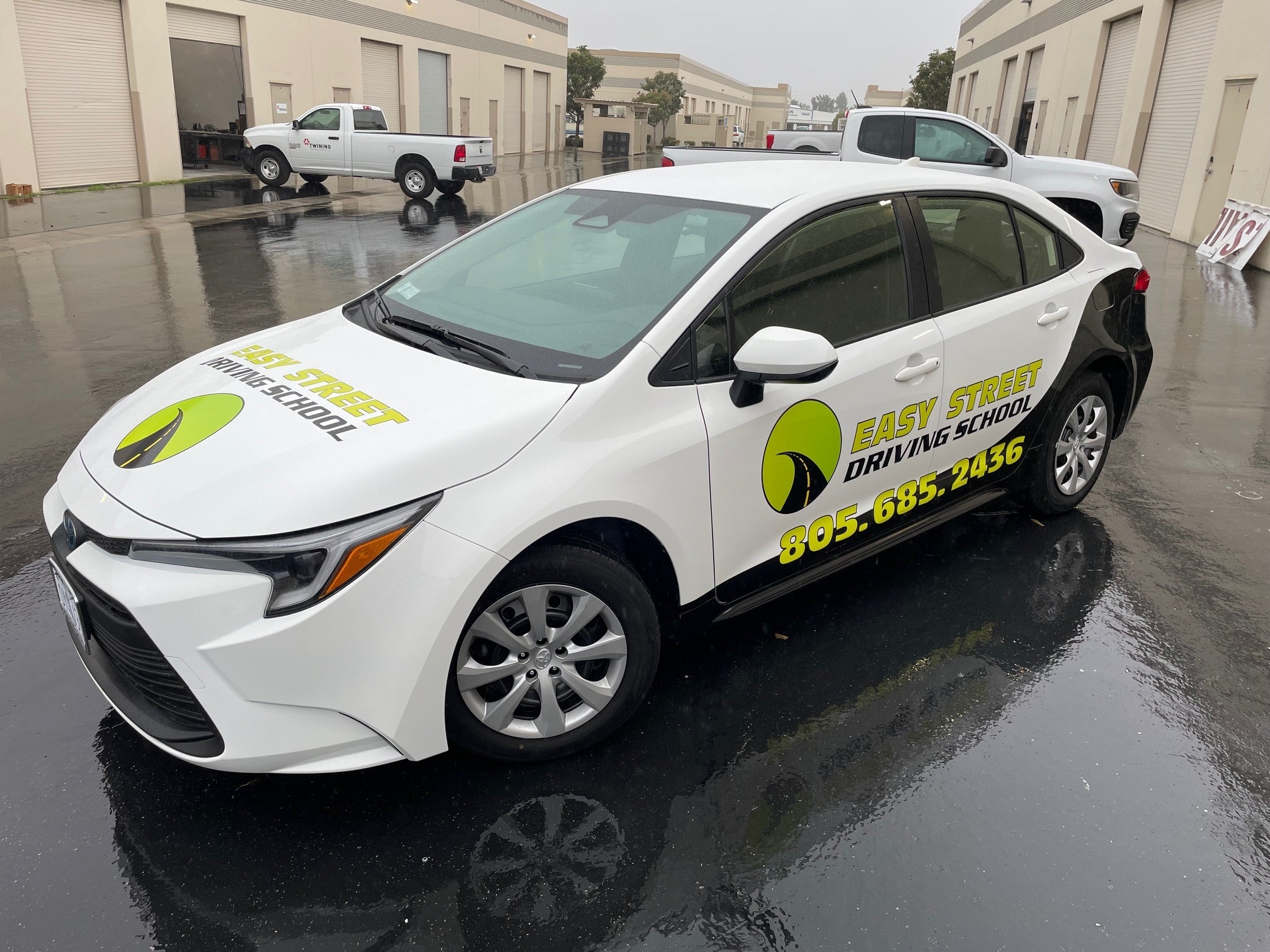 Custom vehicle wrap for Easy Street Driving School designed by Signarama featuring bold branding