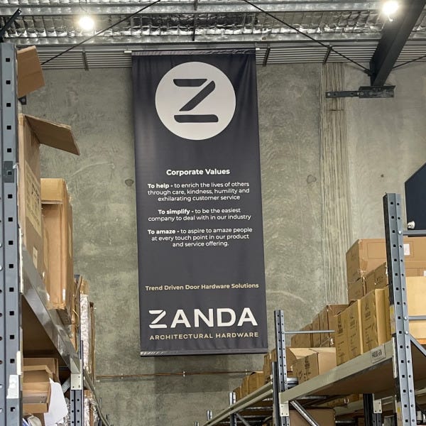 Ceiling hung wall banner sign for Zanda in Yatala by Signarama Brendale