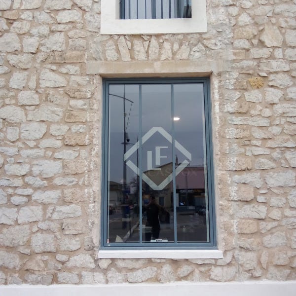 logo-sticker-vitrage-agence-immobiliere-castelnau-le-lez-signarama-34