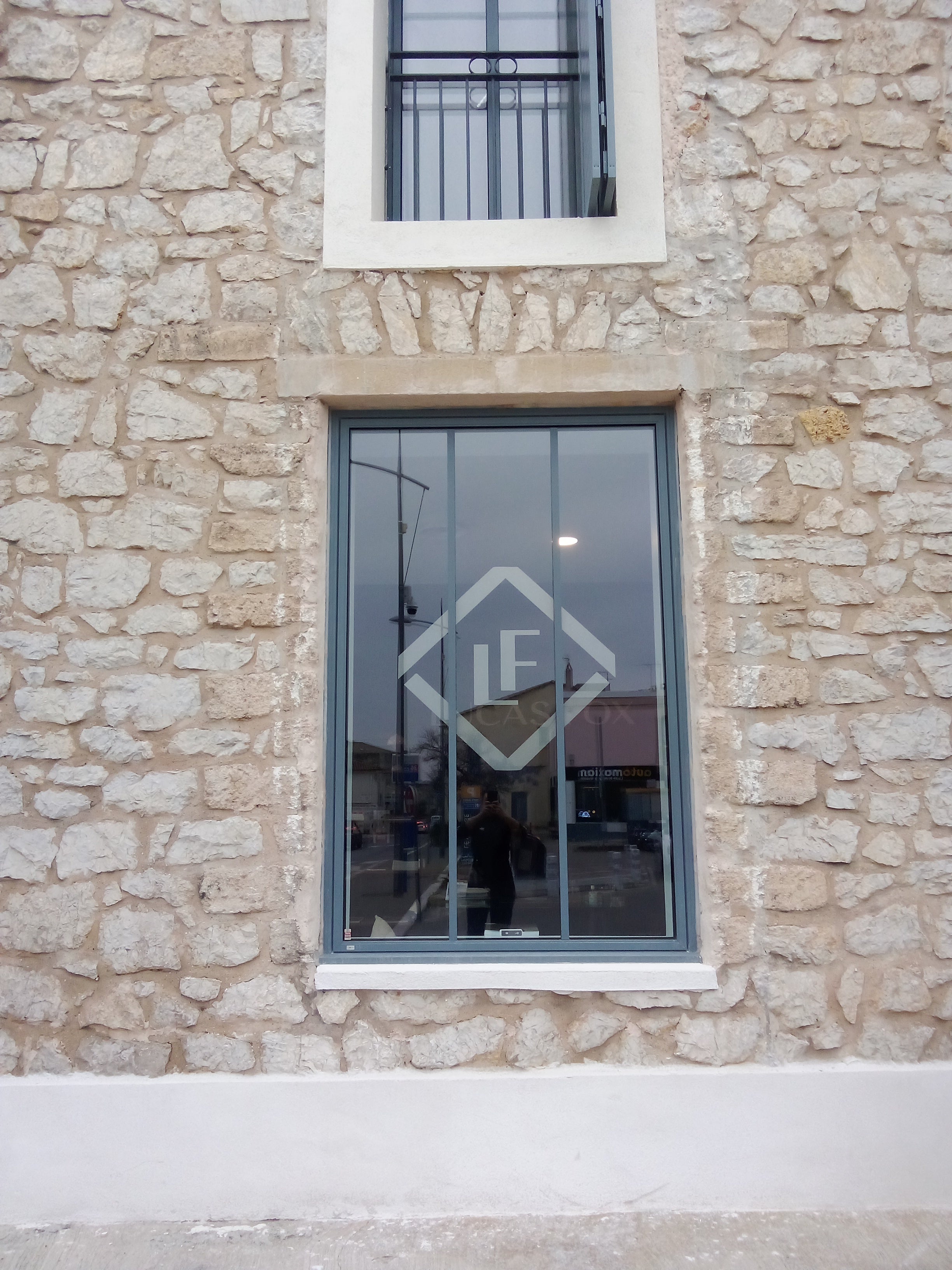 SIGNALETIQUE POUR UNE AGENCE IMMOBILIERE A CASTELNAU LE LEZ