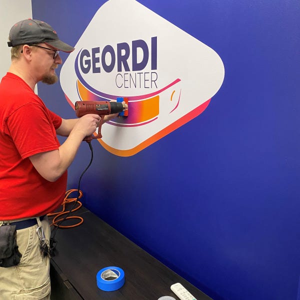 Installing Digtial Lab Left Wall Decal