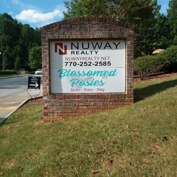Blossomed Posies Monument Sign
