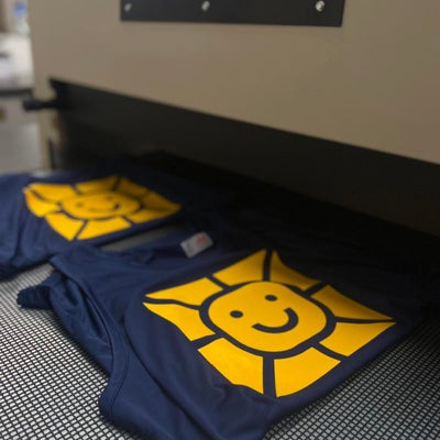 https://cdn.gorilladash.com/images/media/16457335/fully-promoted-usa-behind-the-scenes-of-screen-printing-the-heating-process-square-67d20a04be1ef.jpg?auto=webp&crop=1%3A1%2Csmart&width=400