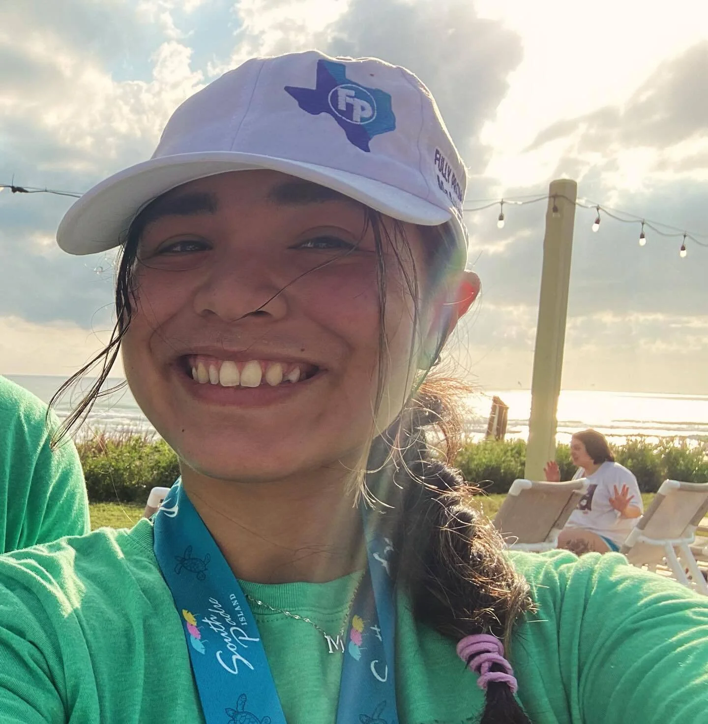 Fully Promoted Member Showing Off the Brand with a Fully Promoted Branded Cap During A South Padre 5k Run
