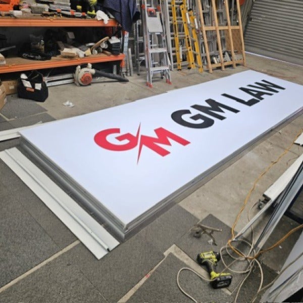 From production to installation, this bad boy brings all the bling to this busy street corner.
