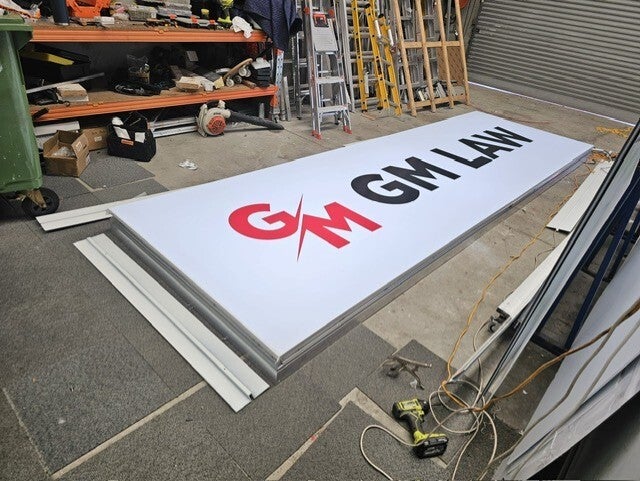 From production to installation, this bad boy brings all the bling to this busy street corner.
