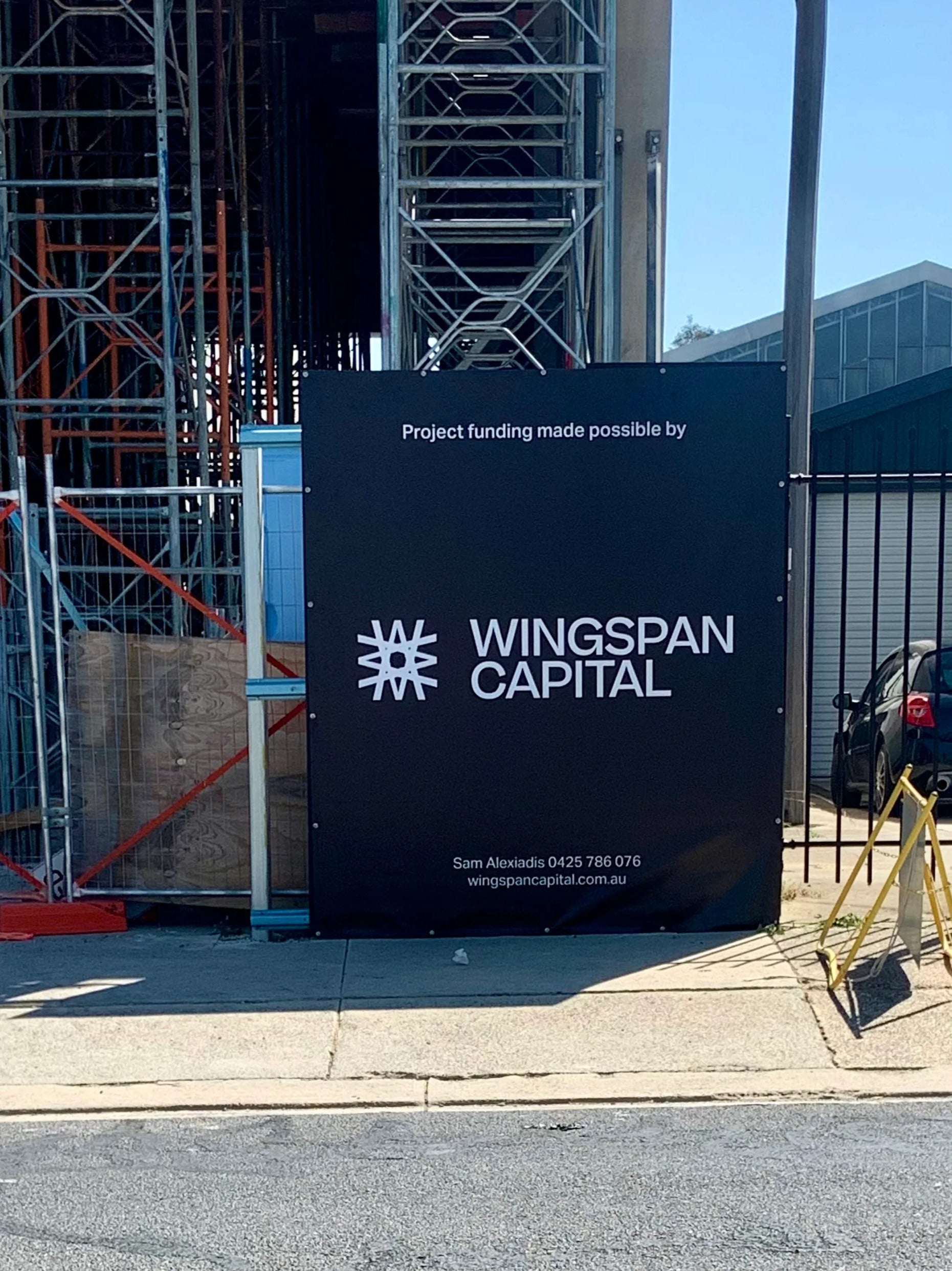 Fence Mesh Banners - Wingspan Capital.