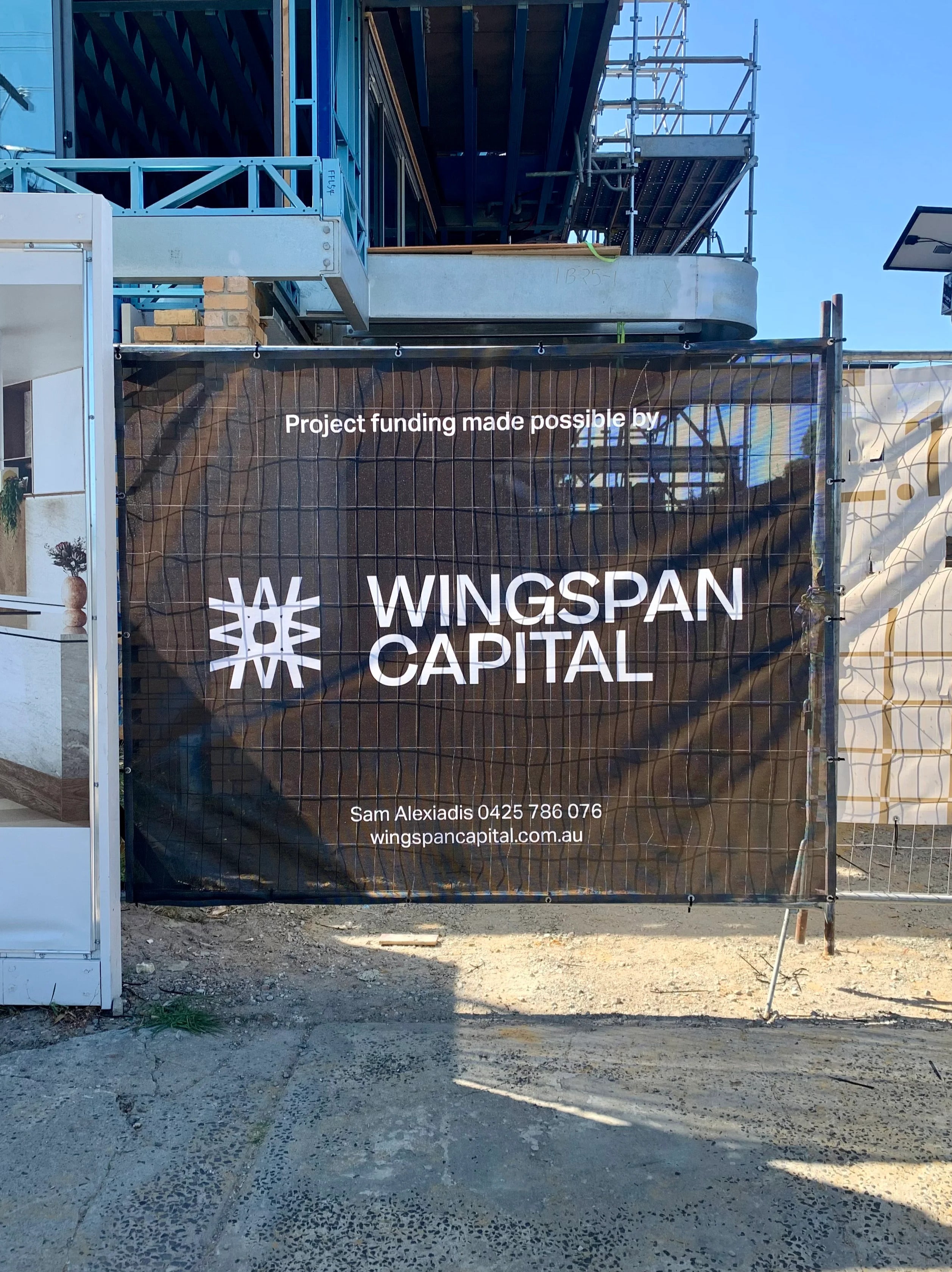 Fence Mesh Banners - Wingspan Capital.