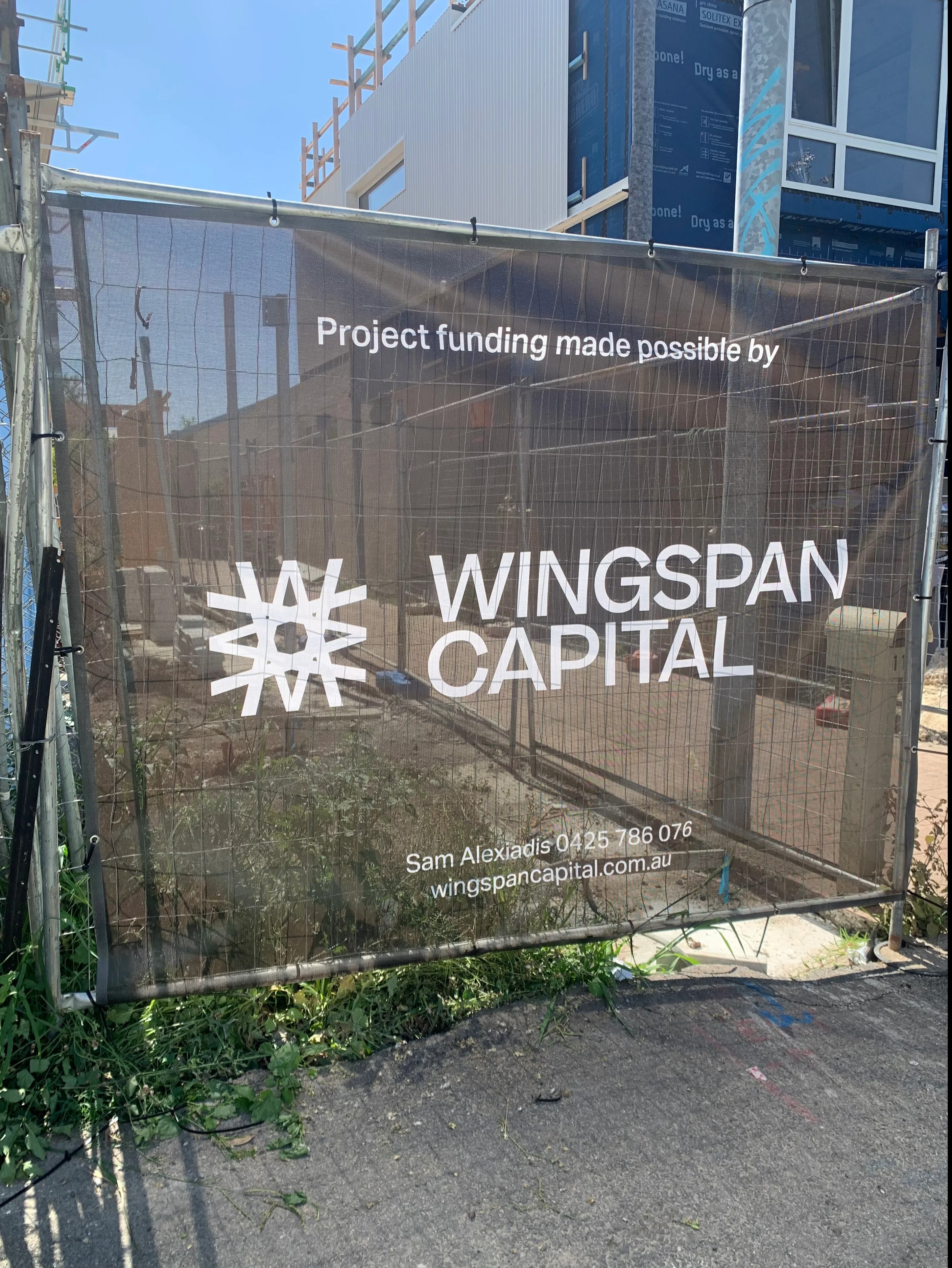 Fence Mesh Banners - Wingspan Capital.