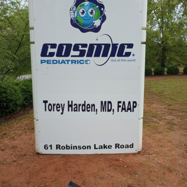 Cosmic Pediatrics Monument Sign