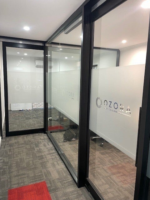 Window frosting, vehicle graphics and front flute and ACM panel for Ozora Energy.