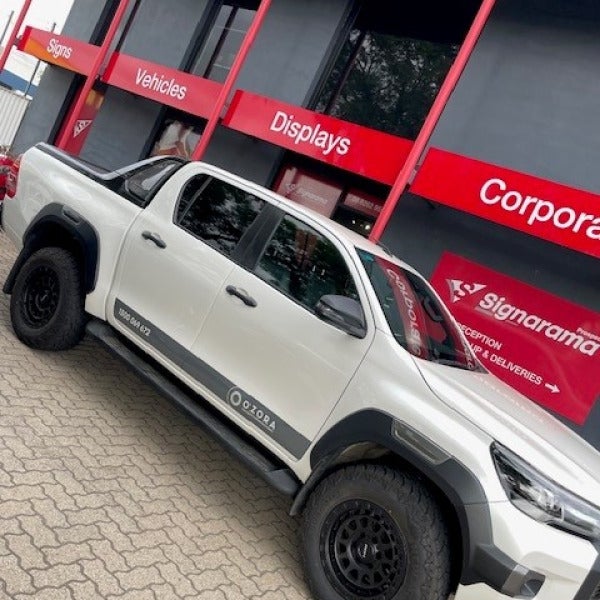 Window frosting, vehicle graphics and front flute and ACM panel for Ozora Energy.