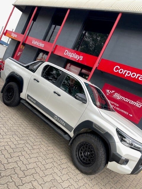Window frosting, vehicle graphics and front flute and ACM panel for Ozora Energy.