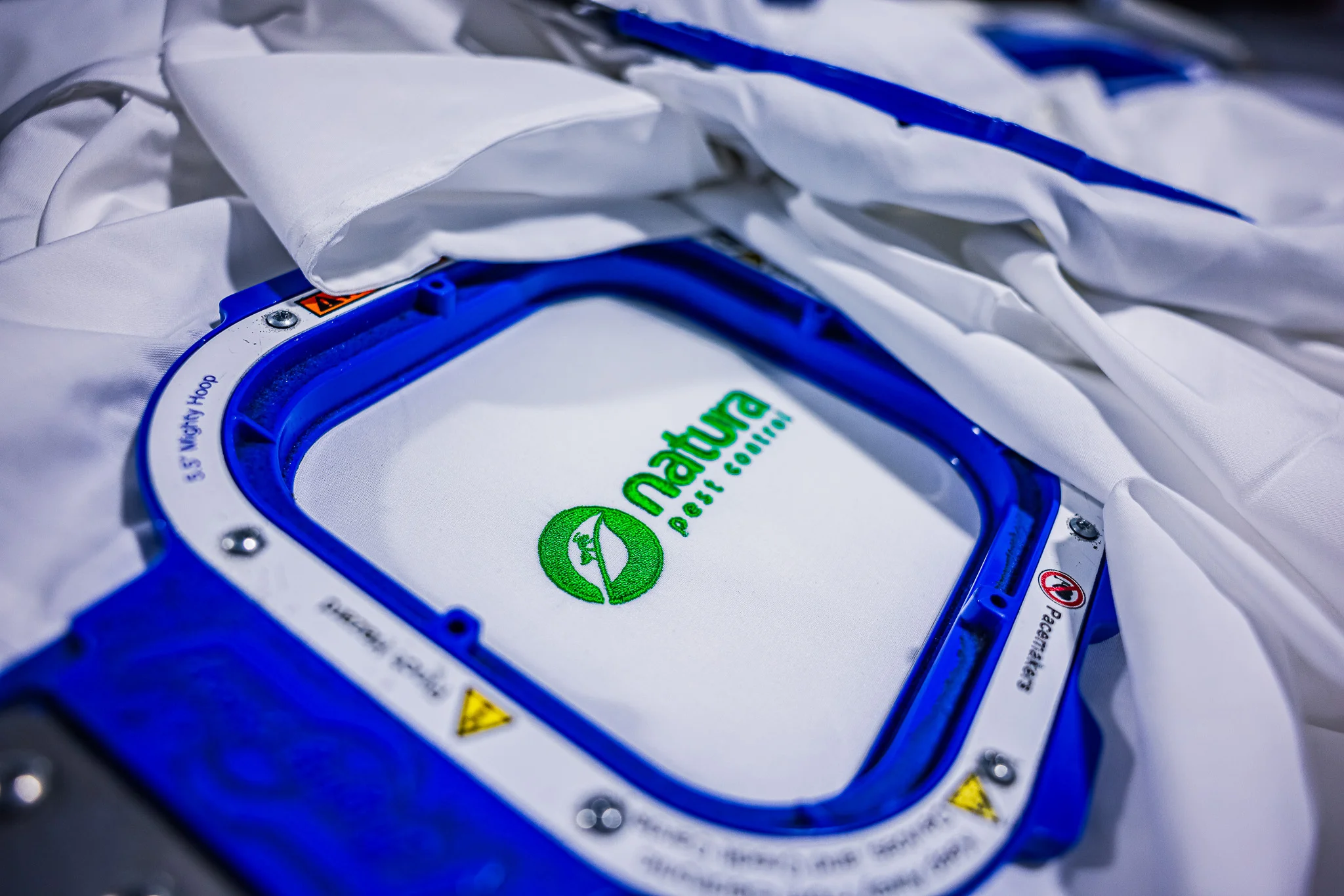 Embroidered Button ups for Natura Pest control