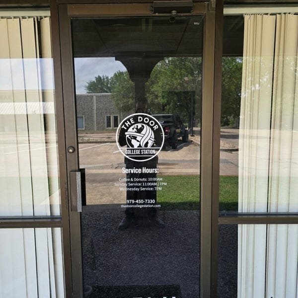 The Door College Station window graphics