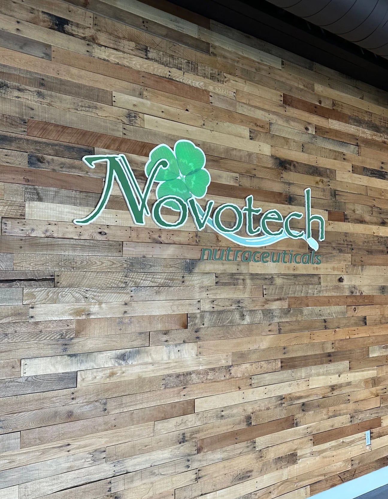 Dimensional Lobby Sign Installation for Novotech – Clean, Modern, and On-Brand
