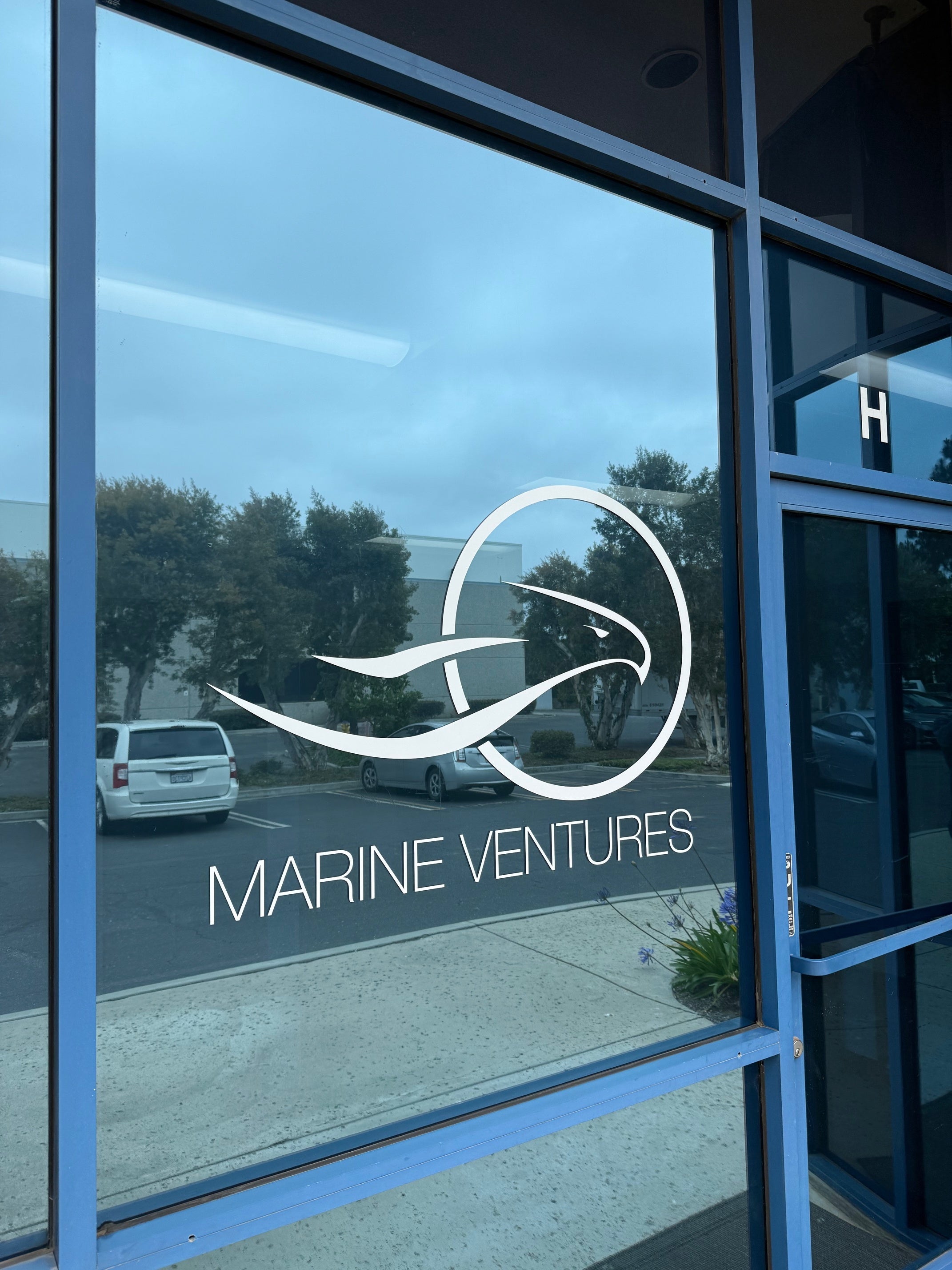 Custom Contour-Cut Vinyl Window Graphics for Marine Ventures