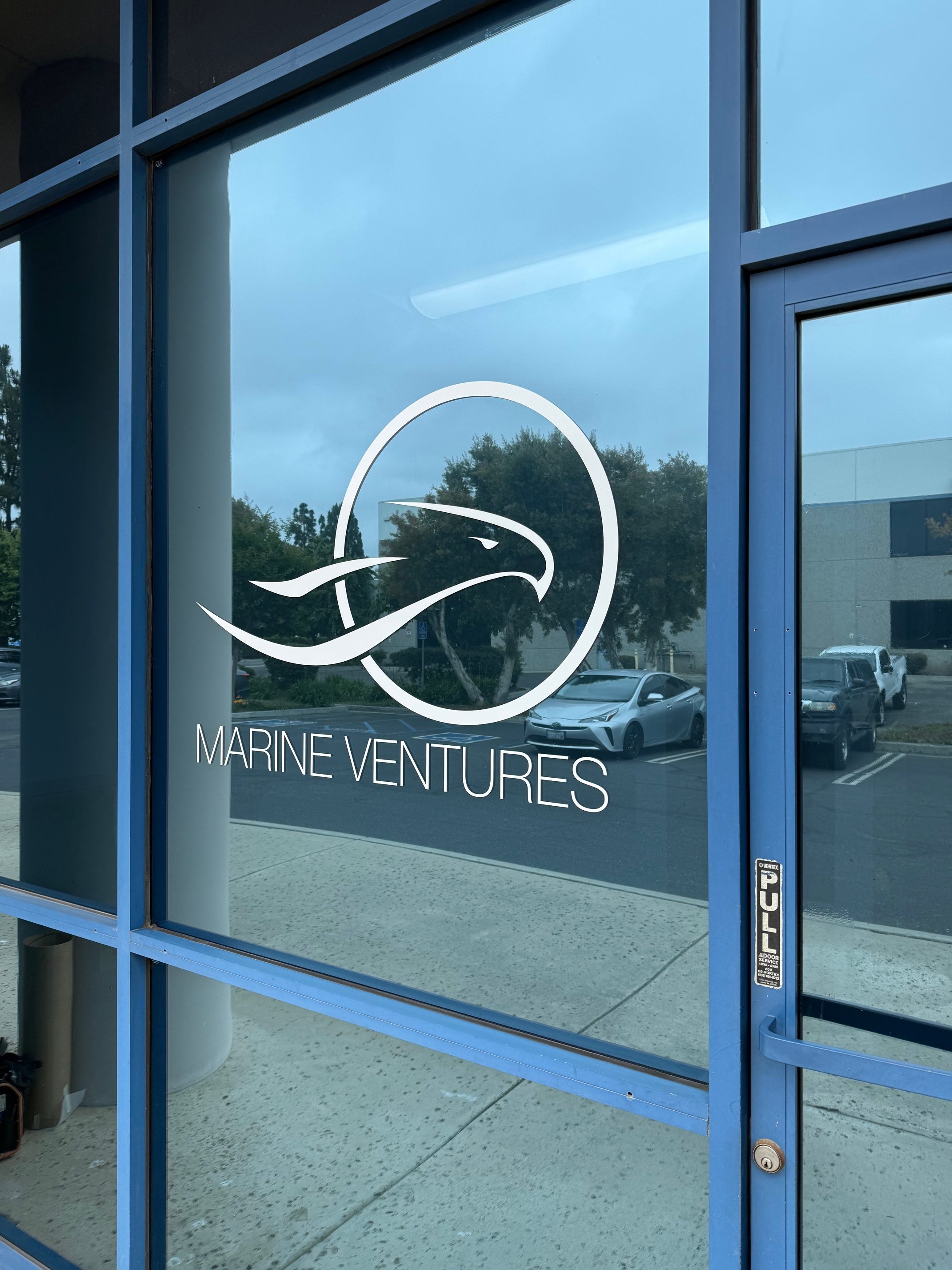 Custom Contour-Cut Vinyl Window Graphics for Marine Ventures