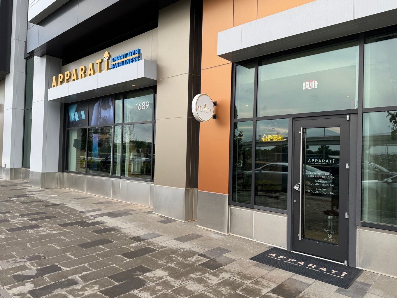 Branded Neon Sign Installed at Apparati Tysons – Featuring Sun & Moon Logo