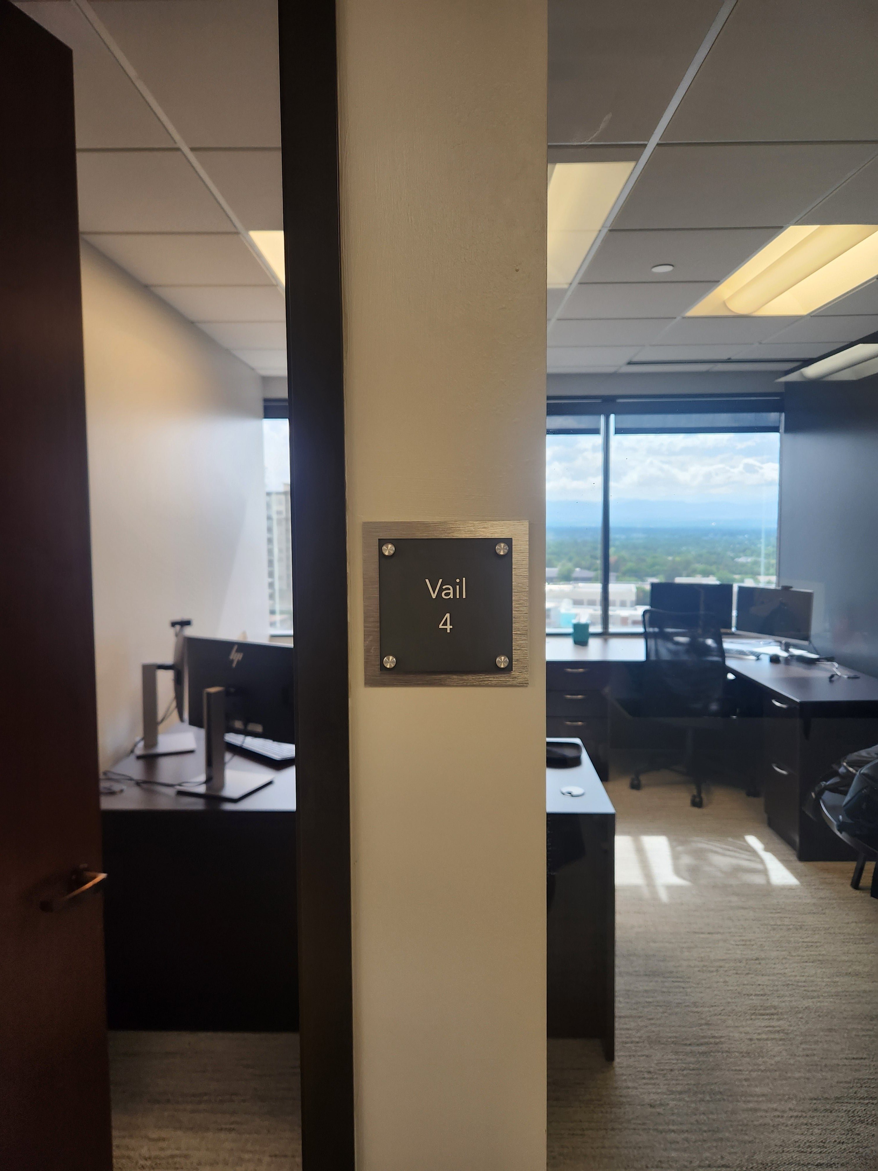 Polished Professionalism: Custom Acrylic & Rowmark Wall Plaques for Offices