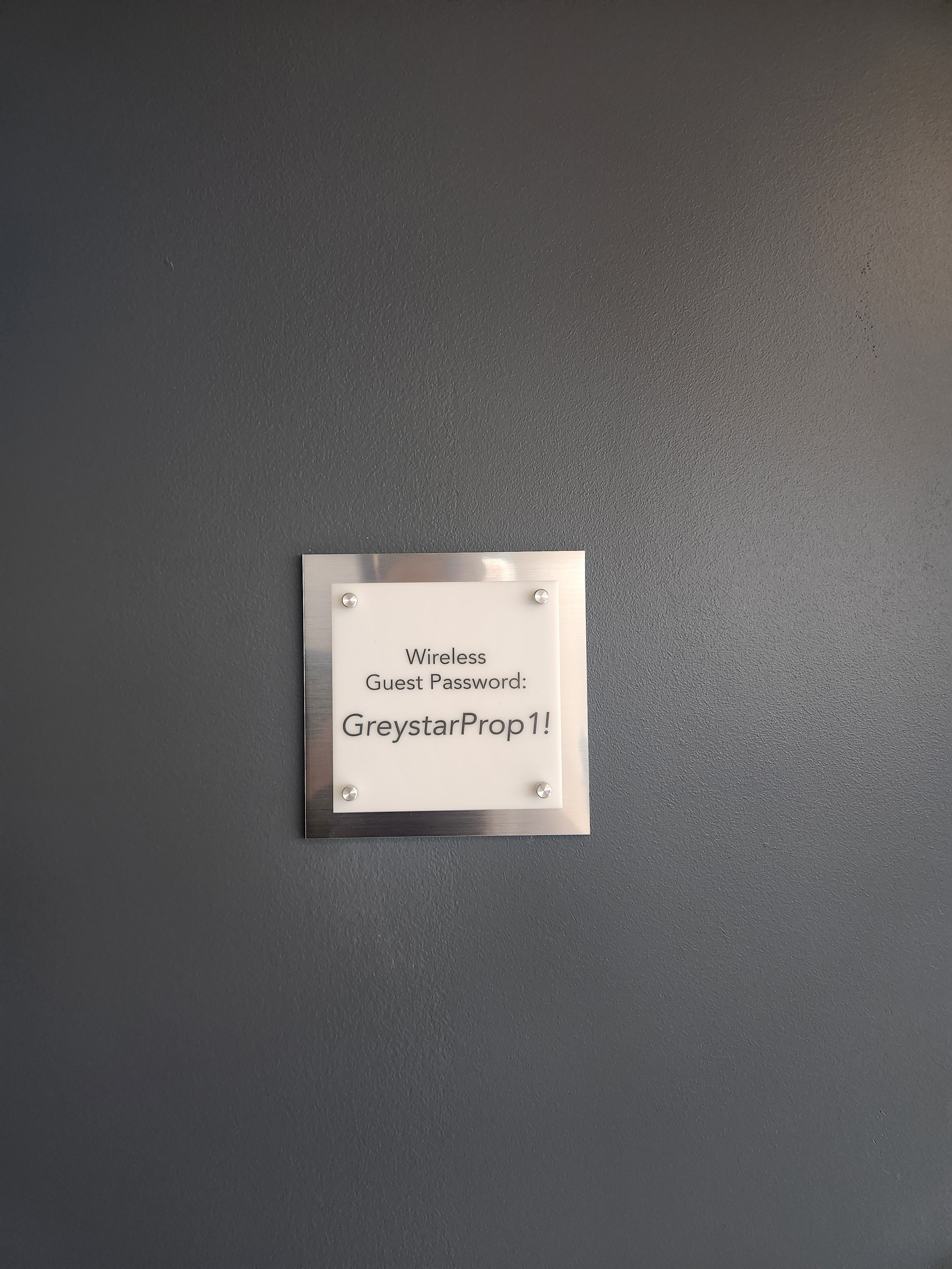 Polished Professionalism: Custom Acrylic & Rowmark Wall Plaques for Offices