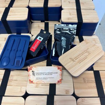 https://cdn.gorilladash.com/images/media/17338772/fully-promoted-usa-kitting-custom-branded-and-packed-bento-boxes-detail-view-square-685aef0fb5c5b.jpg?auto=webp&crop=1%3A1%2Csmart&width=400