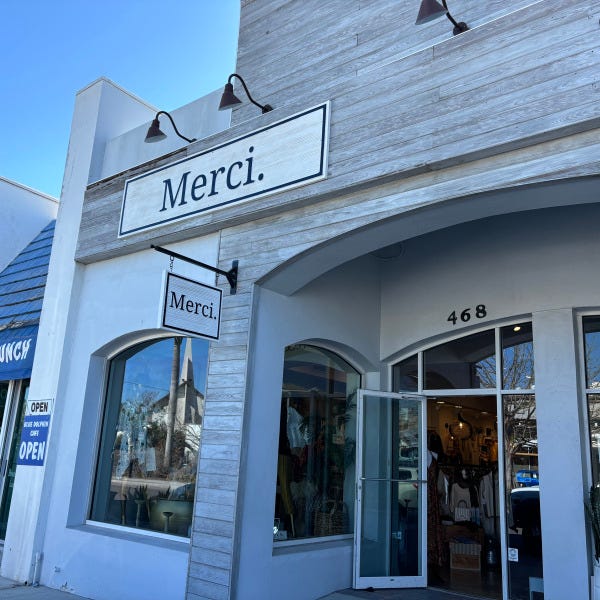 Merci Building Signs