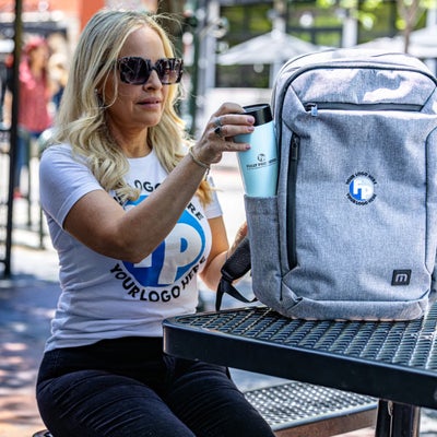 https://cdn.gorilladash.com/images/media/17366319/fully-promoted-usa-mm-0625-your-logo-here-backpack-square-6863f52cebb5b.jpg?auto=webp&crop=1%3A1%2Csmart&width=400