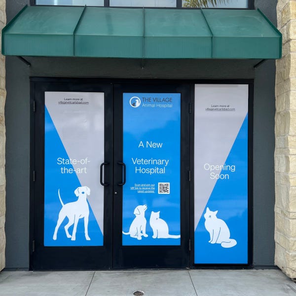 The Village Animal Hospital Banner Window
