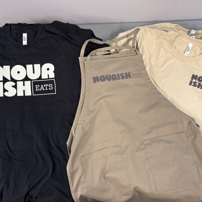 https://cdn.gorilladash.com/images/media/17489937/fully-promoted-usa-nourish-eats-uniforms-square-6877d9fe71a84.jpg?auto=webp&crop=1%3A1%2Csmart&width=400