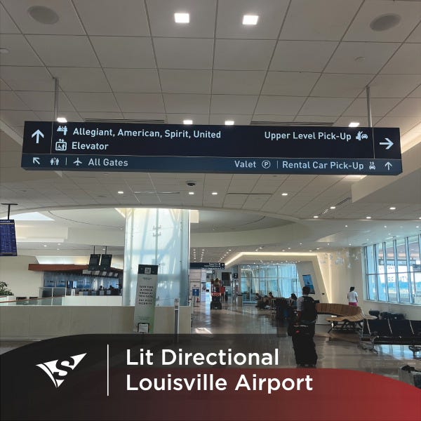 Lit Directional Sign at Louisville Airport