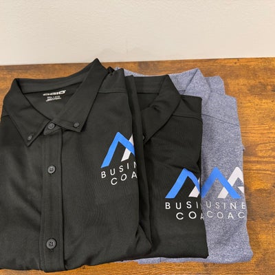 https://cdn.gorilladash.com/images/media/17841781/fully-promoted-usa-mark-allen-button-ups-from-ogio-square-6894d7ba2c3af.jpg?auto=webp&crop=1%3A1%2Csmart&width=400
