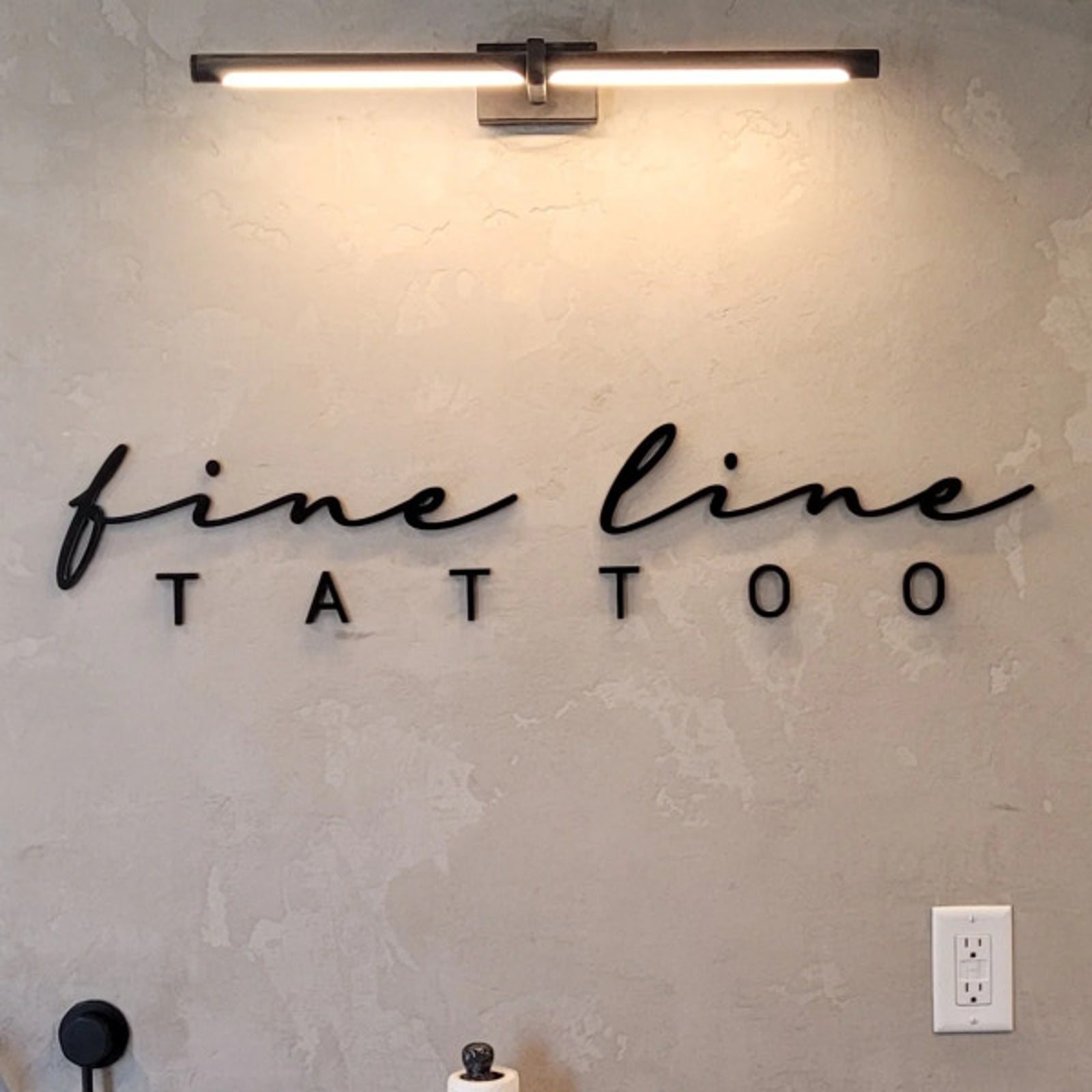 Interior Acrylic Logo for Fine Line Tattoo in Edmonton, AB