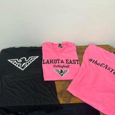https://cdn.gorilladash.com/images/media/18712429/fully-promoted-usa-lakota-east-volleyball-team-shirts-pink-black-square-68a383a1dfbf9.jpg?auto=webp&crop=1%3A1%2Csmart&width=400