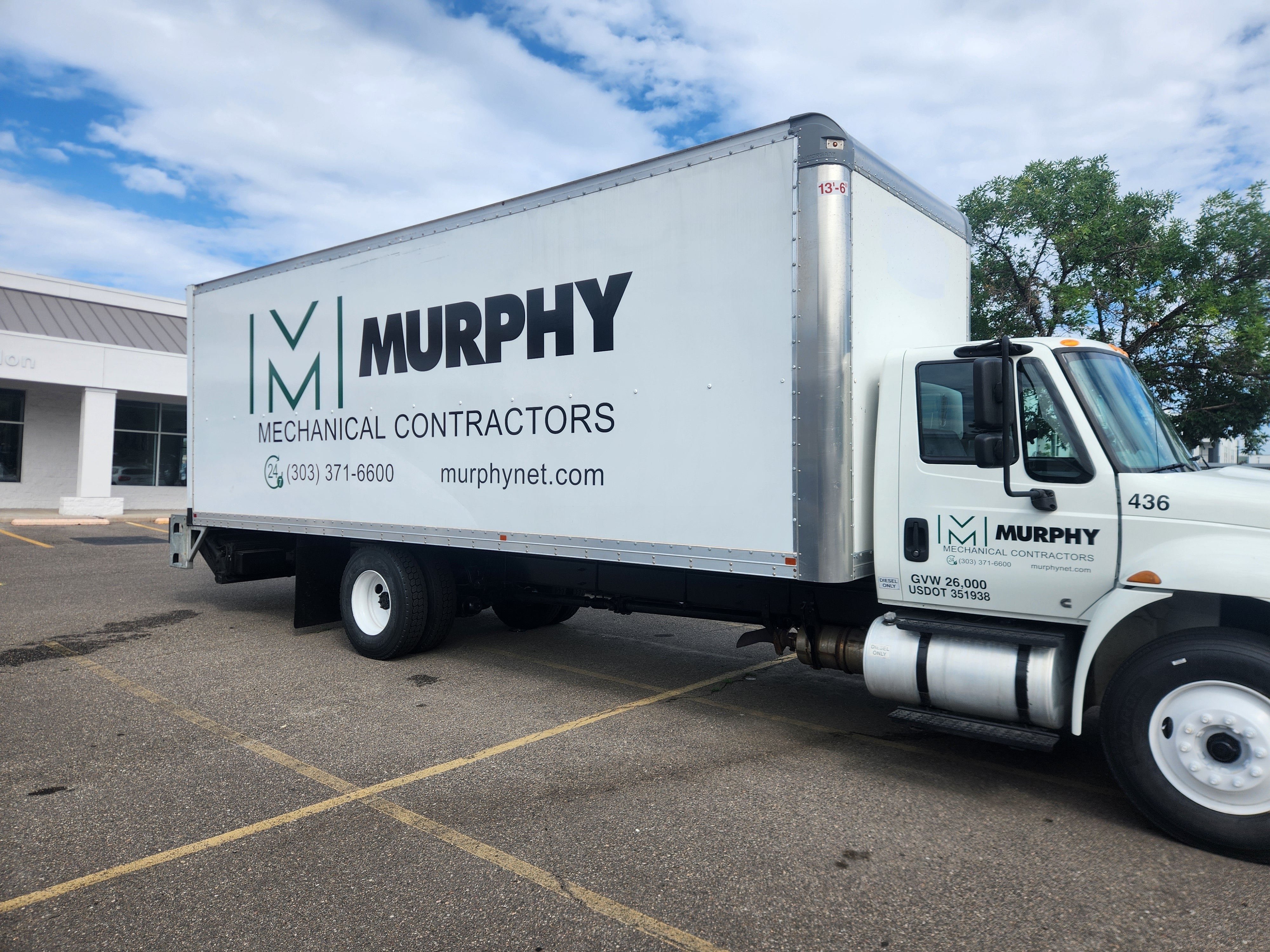 Bold Vinyl Graphics for Box Truck Branding in Denver
