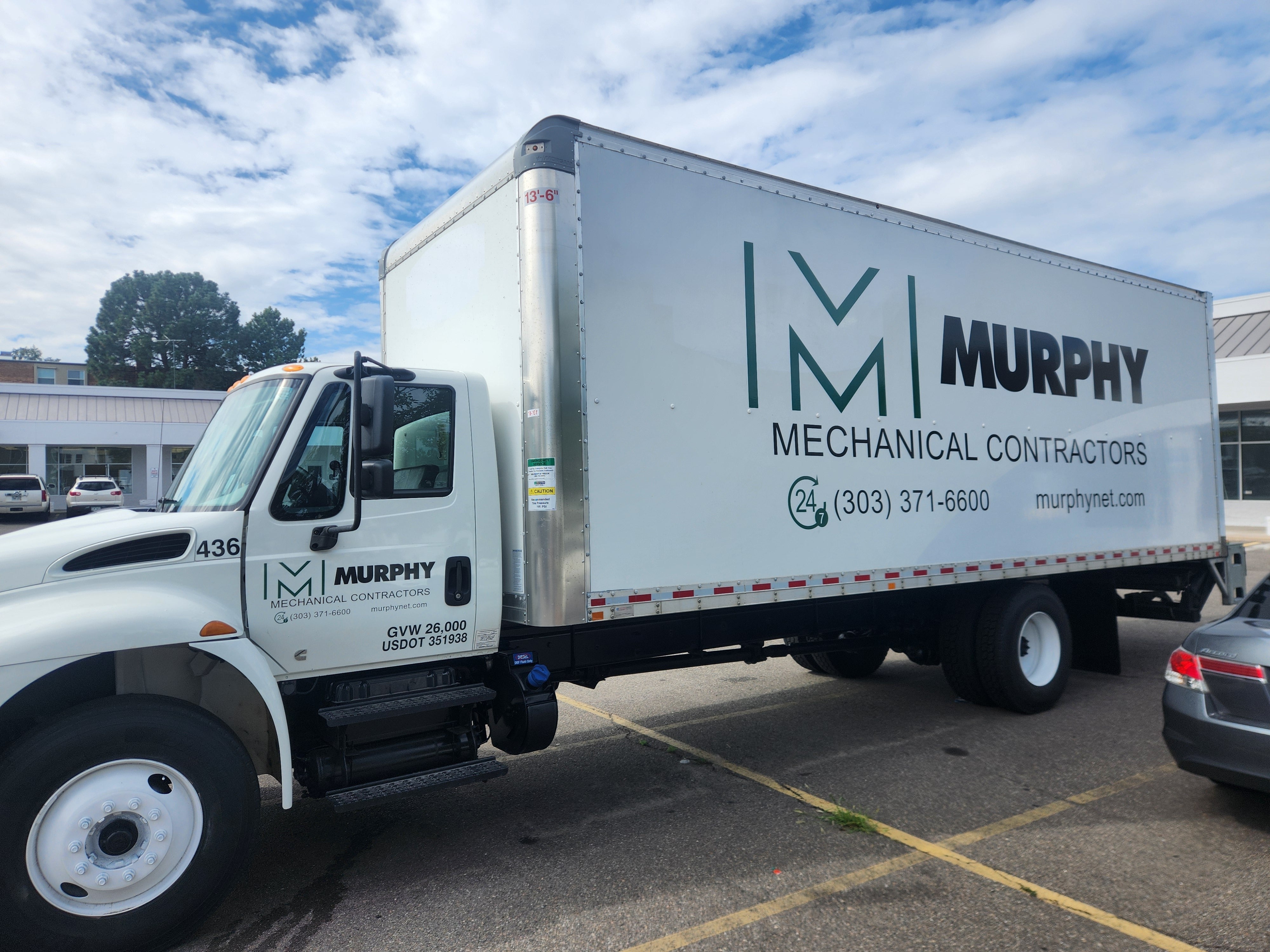Bold Vinyl Graphics for Box Truck Branding in Denver