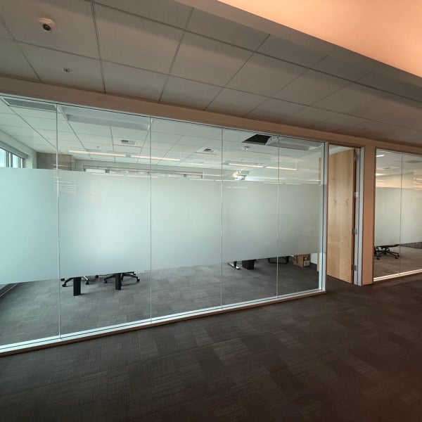 Professional installation of frosted office window film Bellevue Redmond Seattle Kirkland Woodinville Renton Bothell