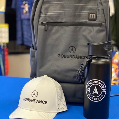 https://cdn.gorilladash.com/images/media/19194501/fully-promoted-usa-gobundance-hat-backpack-tumbler-1-square-68b8a5145cdd4.jpg?auto=webp&crop=1%3A1%2Csmart&width=400