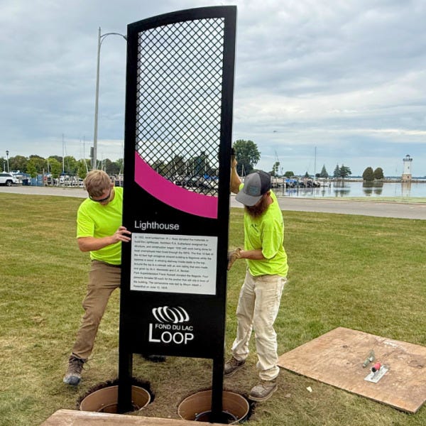 Installation of The Loop Storyboard by the Lighthouse