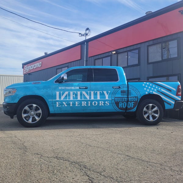 Vehicle Wrap for Infinity Exteriors outside of Signarama building