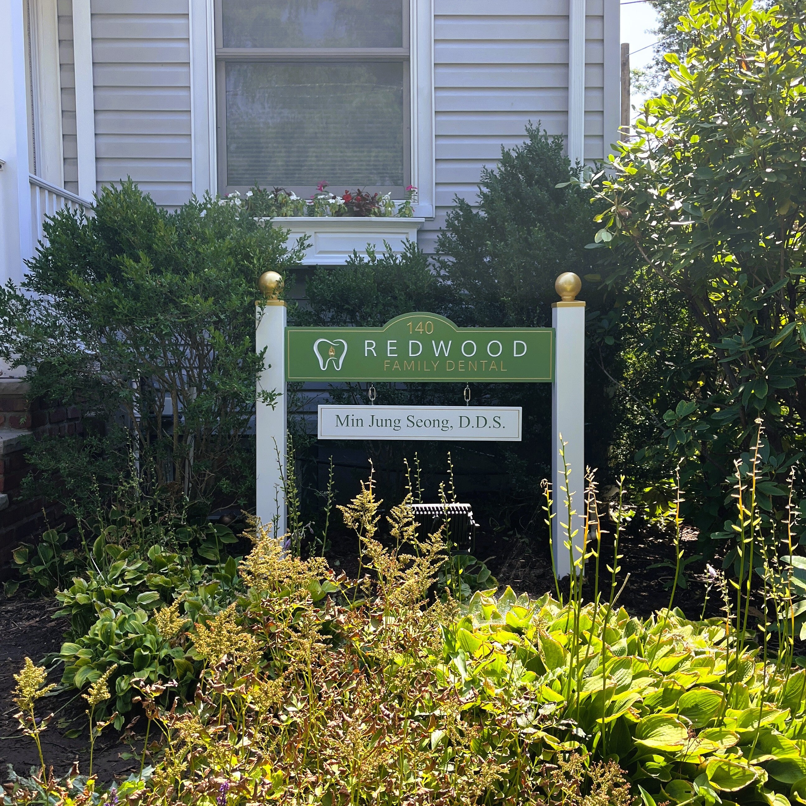 Redwood Family Dental Carved Post and Panel Sign